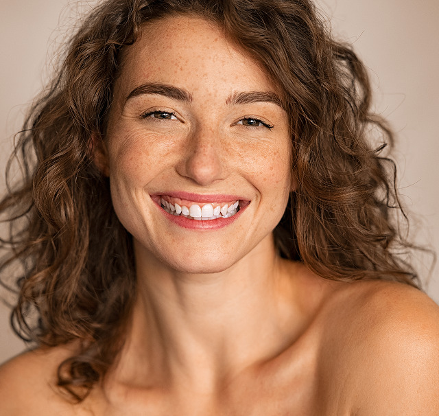 beauty-joyful-young-woman-looking-at-camera-2023-11-27-04-55-50-utc 1